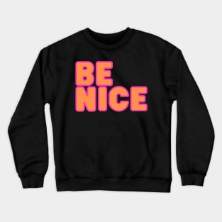 Be nice!  PInk and orange on black background Crewneck Sweatshirt